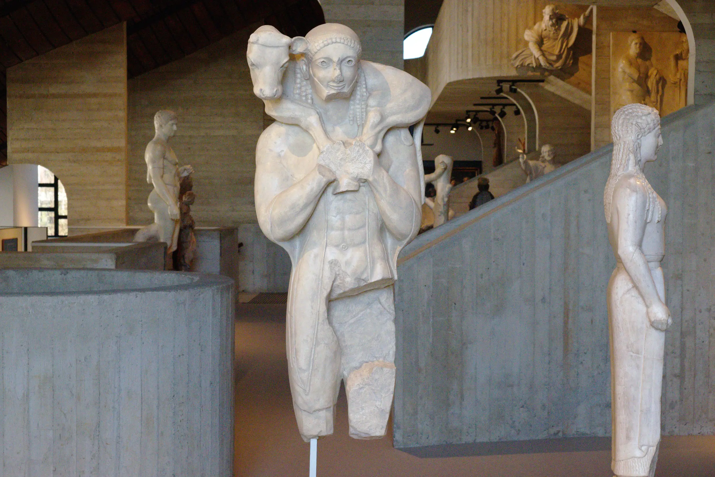 white statues in a museum