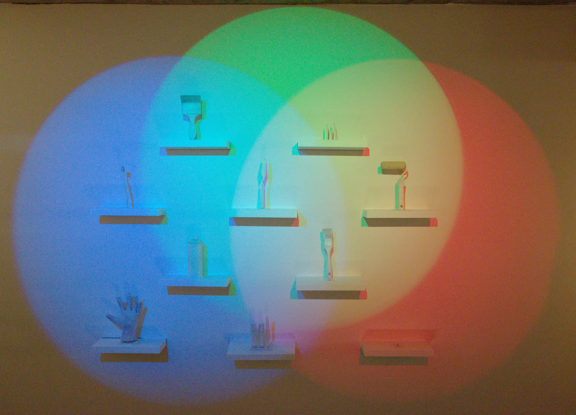 a variety of objects on shelves lit by red, green, and blue lights